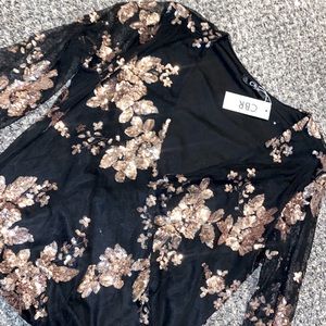 Black and gold sequin blouse